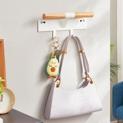 China Contemporary Wall Mounted Storage Rack Home Wall Mounted Handbag Storage Rack With Hook for sale