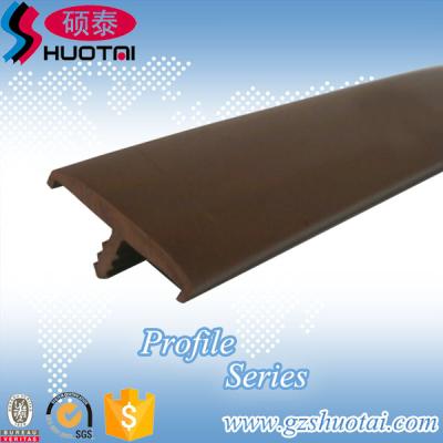 China Soft Or Rigid Material Grade T Size PVC Molding Brown Plastic Edging for sale