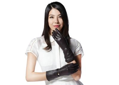 China Women Hollow Pattern Mid Length Leather Gloves with Metal Button , Goat Leather  Gloves for sale