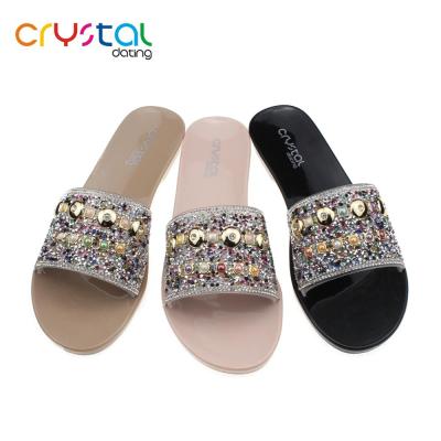 China Slippers Ladies Acrylic Stone Upper Flat Slippers With Colored Outsole for sale