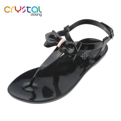 China PVC Ladies And Kids Flat T-shape Sandals With PVC Flower for sale