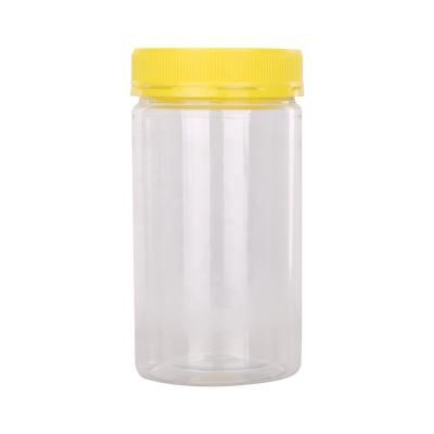 China Food Grade Plastic Honey Jar With Screw Cap Lid for sale