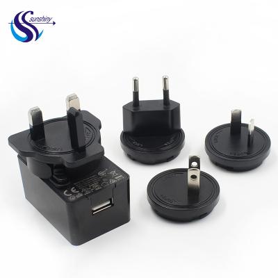 China UniversalÂ  Ek Eu Uk Us Jp Plugs Interchangeable Plugs Usb Charger 5v 1a 1.2a 1.5a 2a 2.1a 2.4a 3A convertible plug Charger for sale