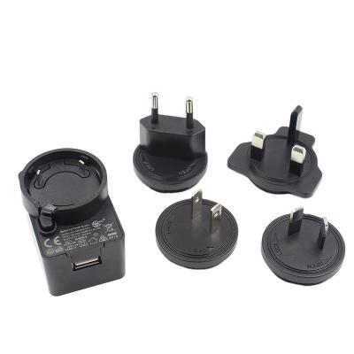 China UniversalÂ  CE GS UL FCC RoHS US EU UK AU plug 18W 5V 1a 1.5a 2A 3a 3000mA interchangeable plug Usb charger for sale