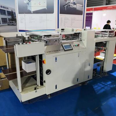 China Industrial High Speed ​​Automatic Loose Leaf Paper Punching Machine SPB-550 for sale