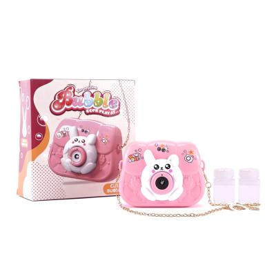 China Multifunctional Amazon Bubble Machine Music Light Bubble Water Toy Cartoon Handbag Bubble Water Hot Selling Toy For Children for sale