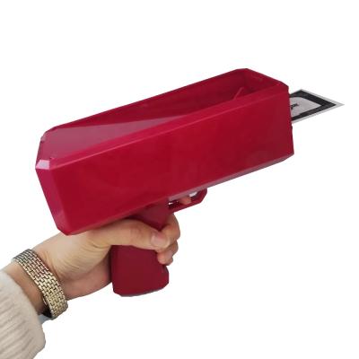 China Hot Selling Festival Party Amazon Money Gun Party Props Spray Cash Dollar Bill Plastic Super Gun Toy for sale