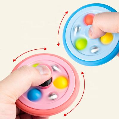 China New Design Portable Stir Reliver Effort Snap Finger Bounce Rotation Gyro Decompression Stirring Person Toy for sale