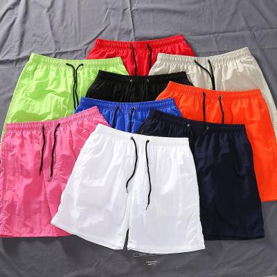 China Custom QUICK DRY Double Layer Mesh Mens Street Wear Beach Logo Shorts With Pocket for sale