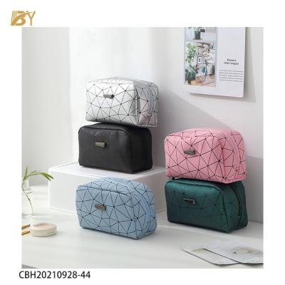 China Custom Logo Organizer Bag High Quality PU Leather Portable Small Travel Makeup Bag Waterproof Cosmetic Bag For Women for sale