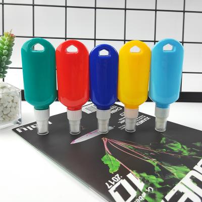 China Household Products 50ml 60ml Travel Bottle Flip Cap Keychain Leakproof Empty Plastic Squeeze Container Refillable Spray Bottle For Liquid Gel for sale