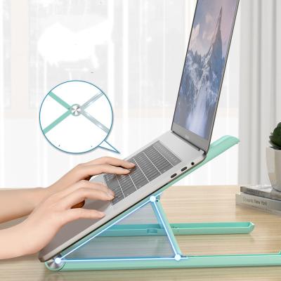 China Ergonomic Portable Foldable Adjustable Computer Stand Notebook Riser Laptop Stand Compatible for sale