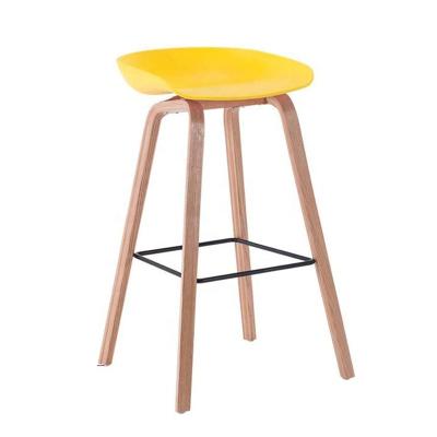 China Contemporary Scandinavian Counter Design Yellow Height Plastic Bar Chair With Wooden Leg for sale