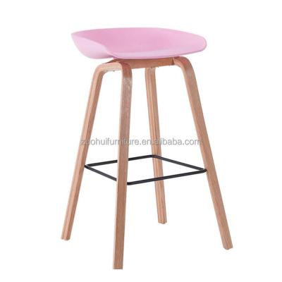 China Contemporary Scandinavian Design Counter Height Pink Plastic Bar Chair With Wooden Leg for sale