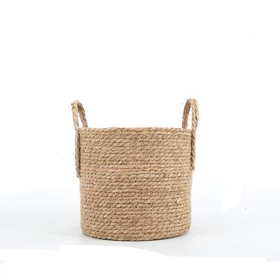 China Simple Straw Flowerpot Woven Flower Basket Rattan Portable Manual Tassel Willow Decorative Flowerpot for sale