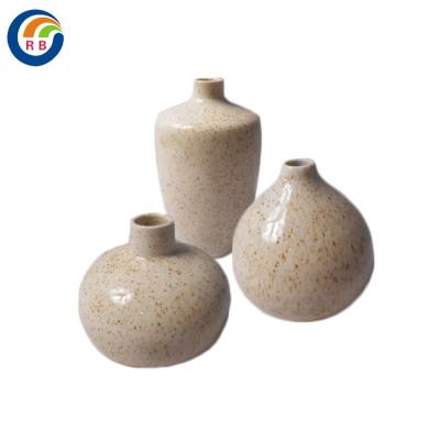 China Hotsale Amazon Porcelain Flower Minimalist Ceramic Home Decor Flower Vase Decorative Round Khaki for sale