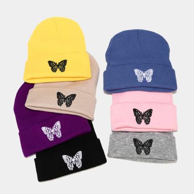 China breathable & Waterproof Fashion Knitted Beanies Hat Butterfly Embroidery Winter Ski Hats Woman Warm Winter Hat for sale