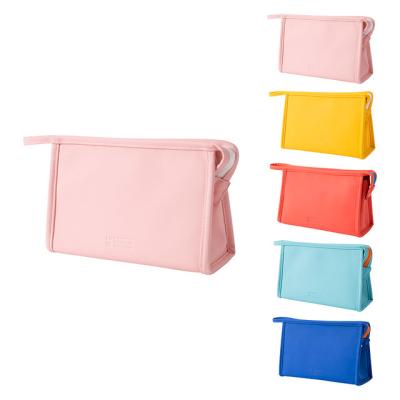 China BUTRADE Fashion PU Candy Color Waterproof Transparent Zipper Cosmetic Bag Portable Bulk Cosmetic Bags for sale