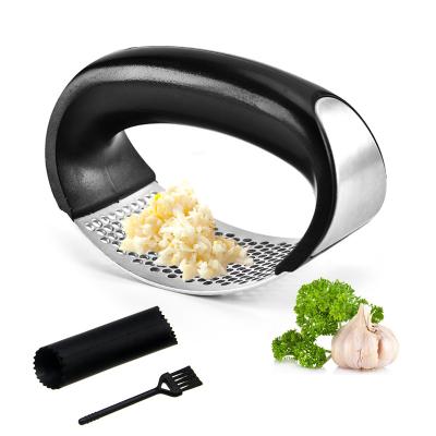 China Sustainable Stainless Steel Garlic Presses Manual Garlic Meat Grinder Cutting Tools Curve Fruit Vegetable Tools Kitchen Instruments and Container for sale