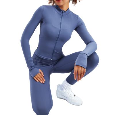 China 2022 breathable hot sale zipper sports tight long sleeve suit with zipper fitness and yoga wear seamless work out set for women for sale