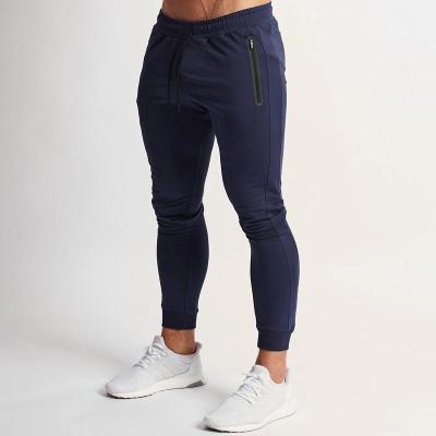 China Custom Wholesale Cotton Sports Mens Gym Joggers Sportswear Breathable Joggers Pants With Zipper Pocket for sale