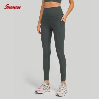 China New Breathable Lulu Yoga Pants Side Pockets Raise Soft Squishy-Friendly Hips To Show Slim Running Fitness Women's Sports Pants for sale