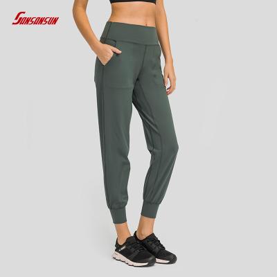 China Breathable 2022 New Custom Skin-friendly Nude Loose Loose Pants Quick-drying Straight Waist Women Yoga Sports Fitness Nine Stitch Pants for sale