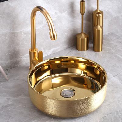 China Modern Elegant Gold Bathroom Vanity Countertops Luxury Ceramic Gold Bathroom Sinks for sale