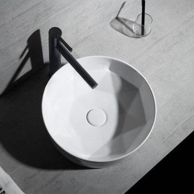 China Modern Hot Selling Handmade Art Basin Countertops One Piece Wash Basin Ceramic White Round Porcelain Sink for sale