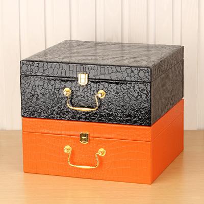 China Large Leather Packaging Box Custom Handmade Leather Gift Boxes Large Sizes PU With Gold Handle for sale