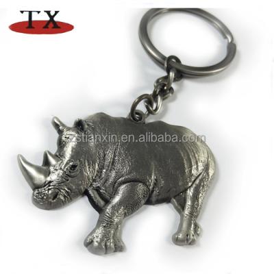 China Promo Mix& souvenirs antique rhinoceros key chain river horse metal key animal with thick gray skin and a horn key chain for sale