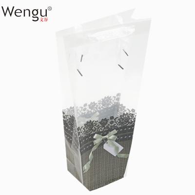 China Recyclable High Quality Ribbon Handle Packaging Flower Package Plastic Bag for sale