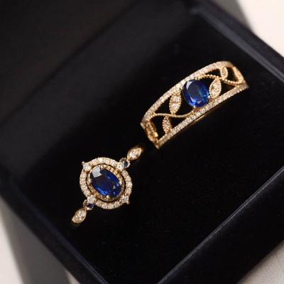 China CLASSIC Xinfly Y2k Jewelry Fashion 18k Gold Palace Style Hollowed Out Olive Leaf Natural Diamond GRM Blue Sapphire Gemstone Luxury Ring for sale