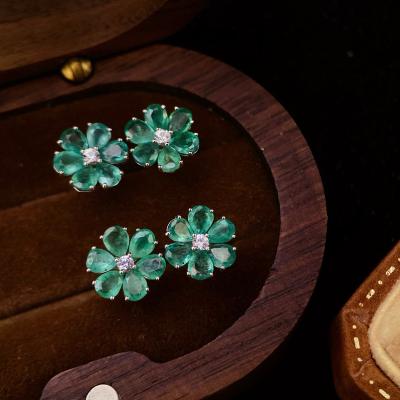 China CLASSIC Xinfly 18k Pure Gold 0.1ct Diamond Flower Shape 1.6ct Drop Emerald Stud Earrings For Women for sale