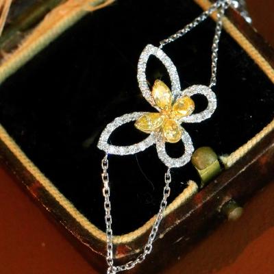 China Cute Xinfly 18k Solid Gold 0.75ct Horse Eye Waterdrop Yellow Diamond Bow Bracelet for sale