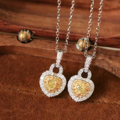 China TRENDY Xinfly 2023 Trendy Elegant Woman 18k Gold 0.15ct Yellow Diamond 0.18ct White Diamond Heart Shape Pendant Necklace for sale