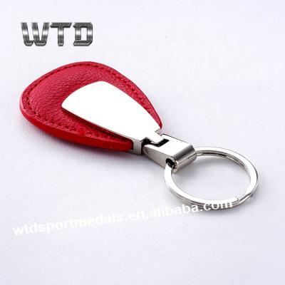 China 8 Years WTD Metal Wholesale Sheath Custom Leather Pepper Spray Key Chain Chain With Logo Design for sale