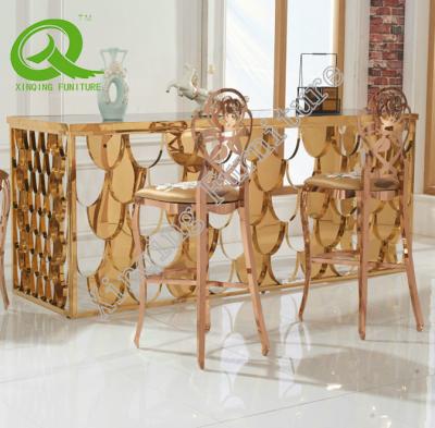 China Modern Wedding Event Tempered Glass Gold Stainless Steel Frame Dining Table for sale