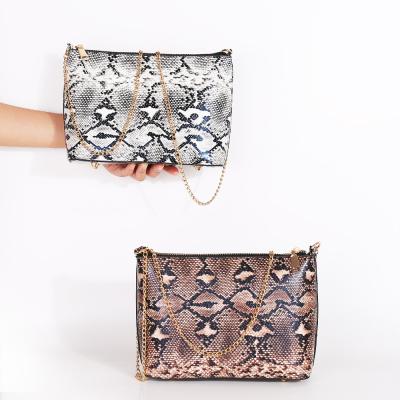 China New PU women's snake chain bag with shoulder bag European and American style cross-launched multifunctional clutch for sale