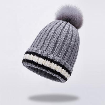 China COMMON Custom Detachable Fur Pom Pom Hats, Cable Faux Stripe Knit Winter Hats For Women Luxury Wool Designer Unisex Pom Pom Beani Warmly for sale