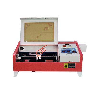 China Water-cooled Portable 40W/50W USB CO2 3020 Laser Engraver Engraving Cutting Machine for sale