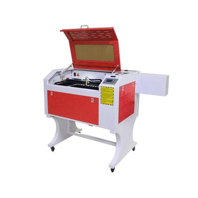 China Water-cooled wood laser engraving machine co2 6040 acrylic laser cutting machine  with ruida system for sale