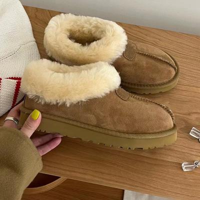 China Shock-absorbing 2023 winter new wool shallow woolen sheepskin snow boots casual daily warm women's shallow boots knocked out boots. for sale