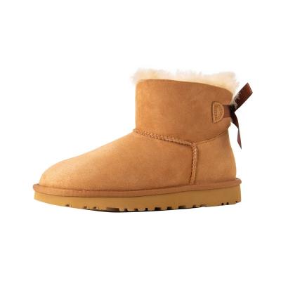 China New fashion trend sheepskin snow boots wool winter ribbon single women's boots warm factory custom fur padded shoes 1016501 for sale