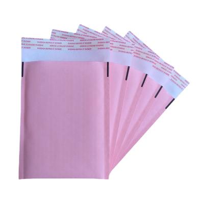 China Nice printing eco friendly a5 packaging printed pink kraft paper envelope bubble mailer for sale