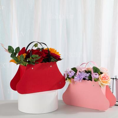 China Wholesale Recyclable Women Hand Carry Waterproof Packing Shopping Bag Flower Wrapping Trapezoidal Bag for sale