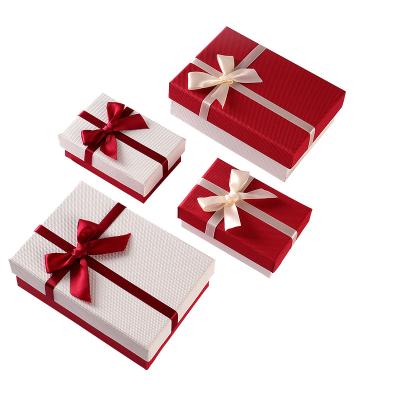 China Recycled Materials Wholesale Best Price White Luxury Cosmetic Box Gift Perfume Box Packaging Paper Box With Satin for sale