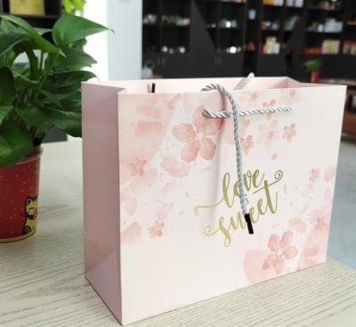 China Designer Recyclable Custom Luxury Printed Mailing Paper Bag For Clothes for sale