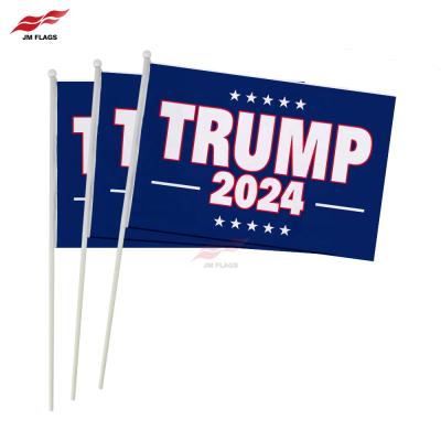 China 100% Polyester Cheap 17.7*11.8 Inch Plastic Trump Stick Flag Parade Flag Event Flag Voting Decoration Trump Stick Flags for sale