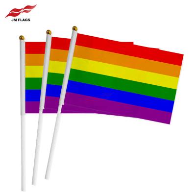 China Pride Day Flag Decoration Polyester LGBT Hand Held Rainbow Stick Flags Non-profit Organizations Custom Rainbow Flags for sale